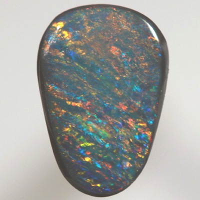 SOLID BLACK OPAL Bands of red and orange over turquoise blue